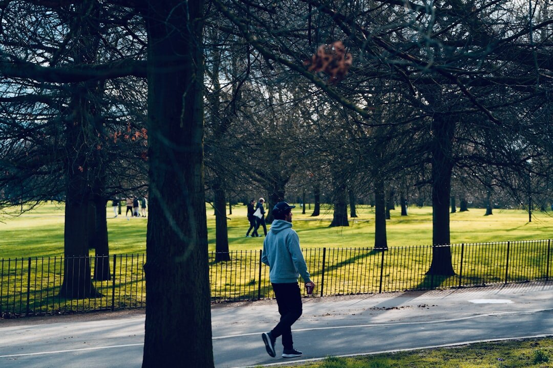 author walking in park for inspiration