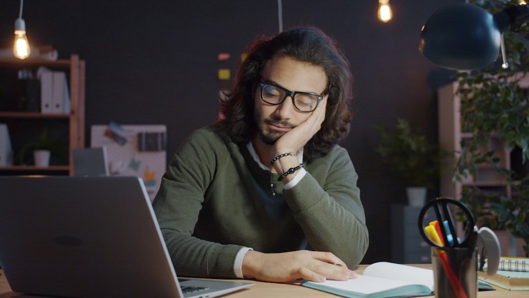 writer at desk with notebook